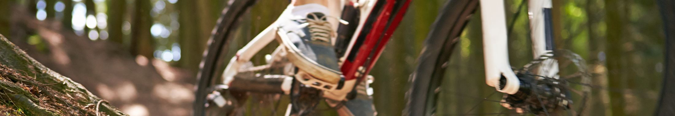 A foot on a bike pedal