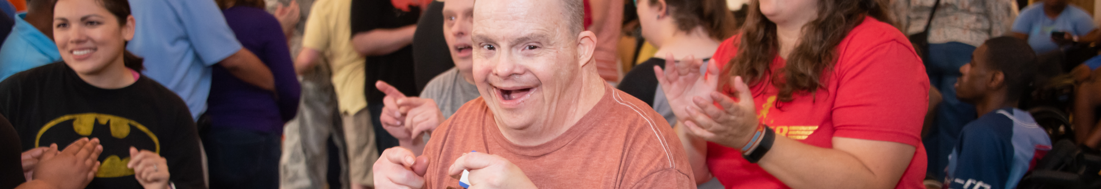 Group dressed as super heroes dancing