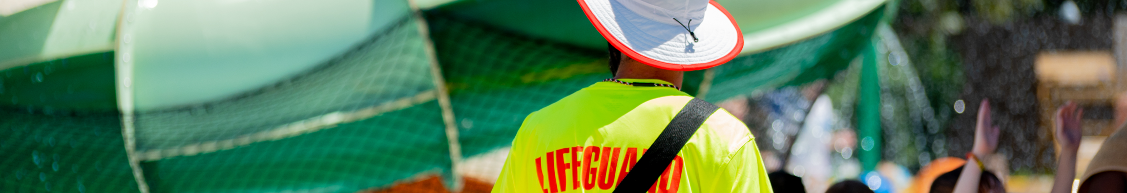 Lifeguard scans the water at Splash Zone Waterpark