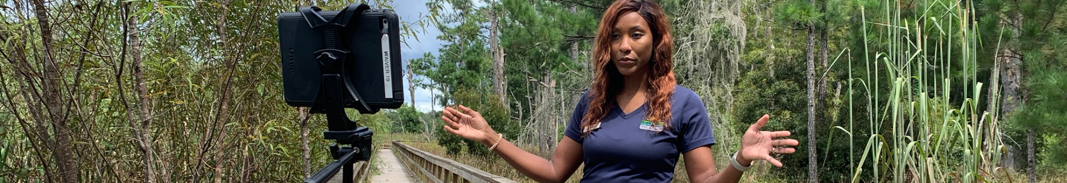 Park staff teach outside via video conference call