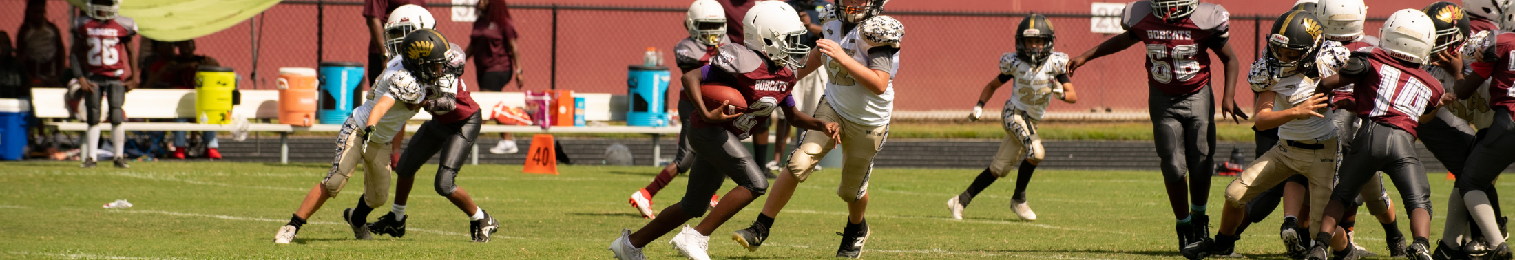 Group of kids playing football