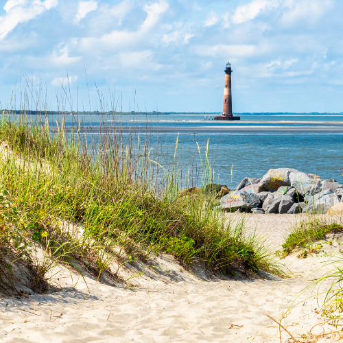 View of the Morris Island Lighthouse with the ocean in the background