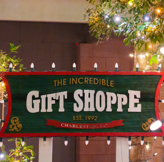 A wooden sign for the gift shop at the Holiday Festival of Lights.